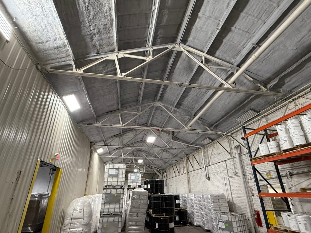 Commercial warehouse interior after spray foam insulation